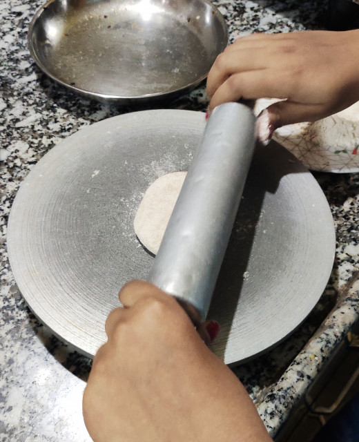 Rolling the ball using rolling pin