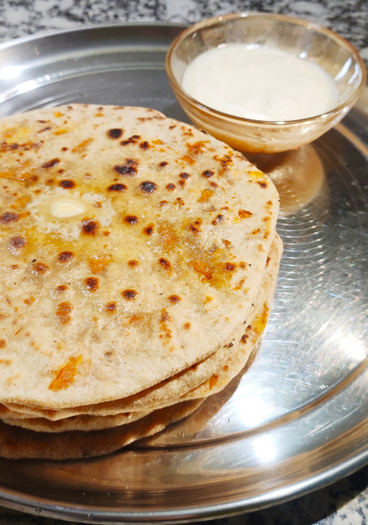 Gajar- Chhena paratha served with curd