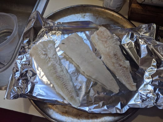 Three fit nicely on a pizza pan covered with foil