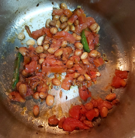 Add chopped tomatoes and fry till cooked well.