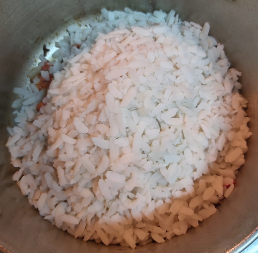 Add soaked and drained flattened rice.