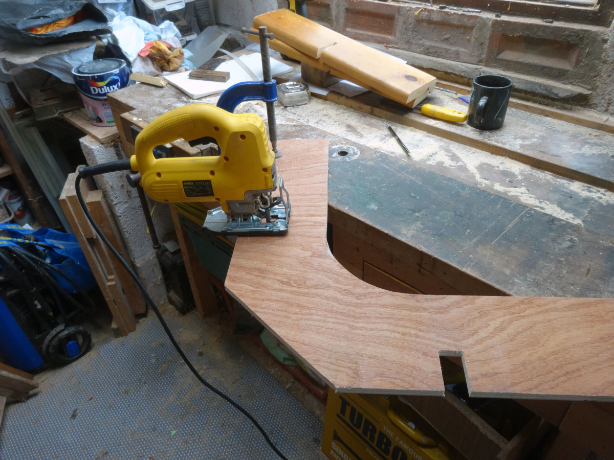Cutting the corresponding bridle joints in the middle shelf