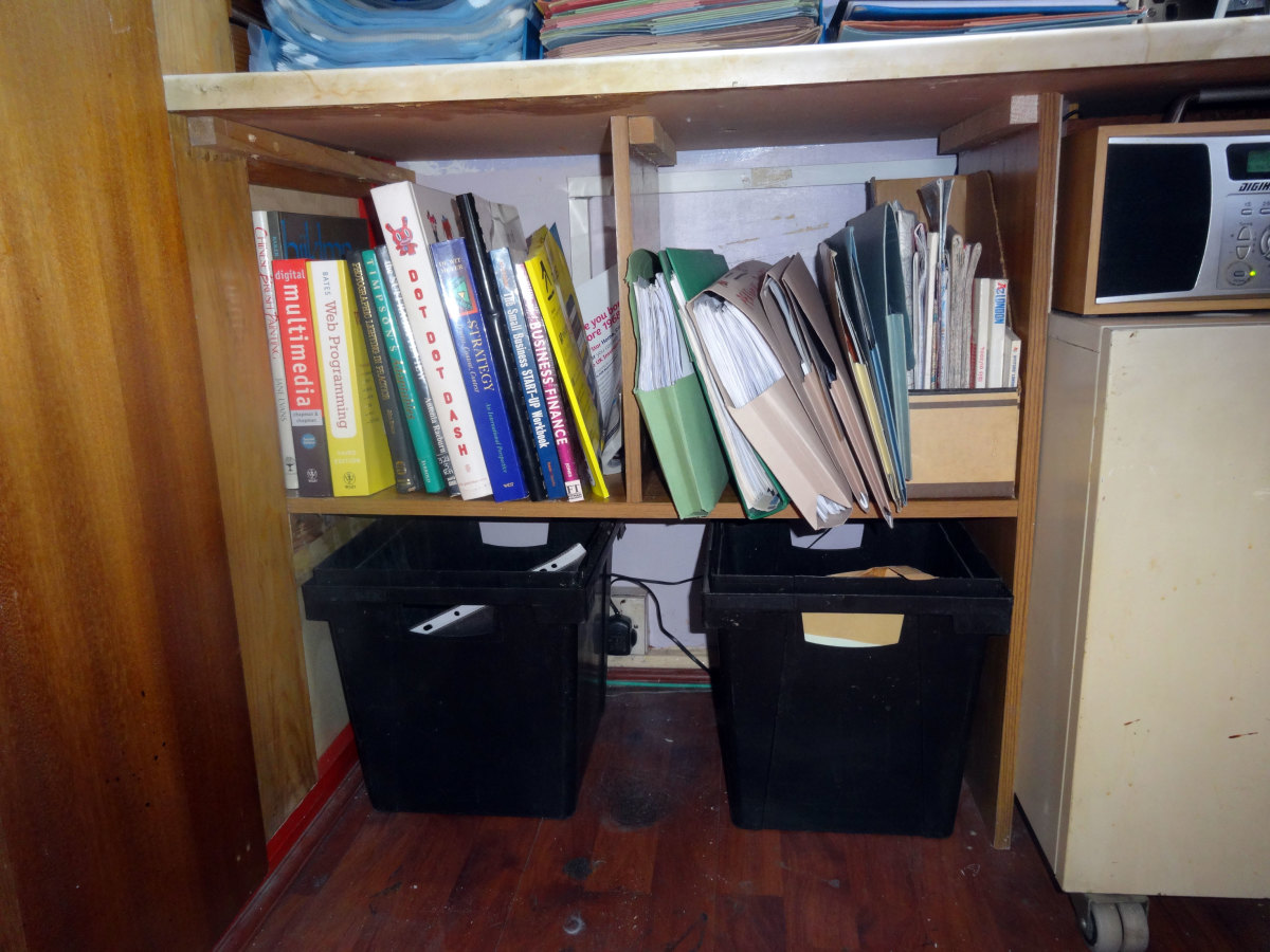 The waste bins slid underneath the new shelving. General waste on the left, and confidential waste on the right