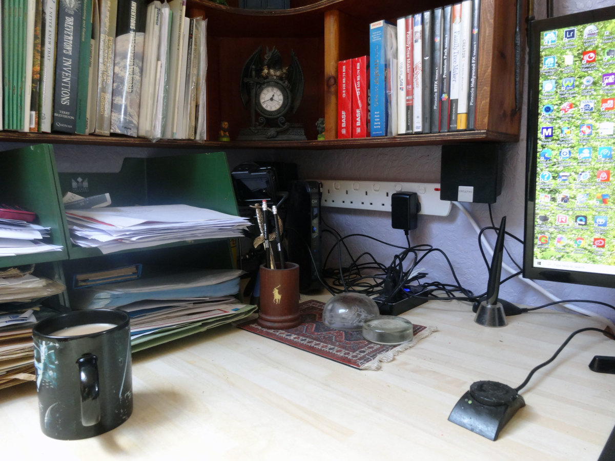 Most of the computer equipment relocated to storage under the desk, to make space for additional filling trays. New six-gang extension lead wall mounted above desk, with four-port USB hub plugged in