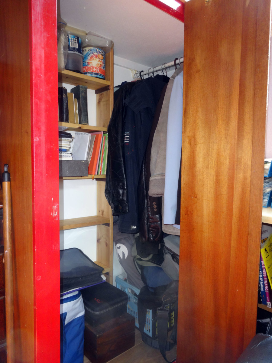 Relocated clothes rail, and new bookcase inside the wardrobe.