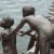 Realistic Sculpture of children about to jump into the river near Fullerton Hotel, Singapore