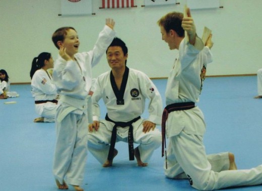 Eric breaking a board. His favorite thing to do in tae kwon do.