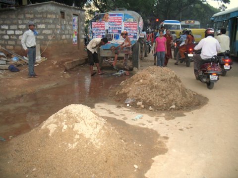 Water for wash right on road no drainage.