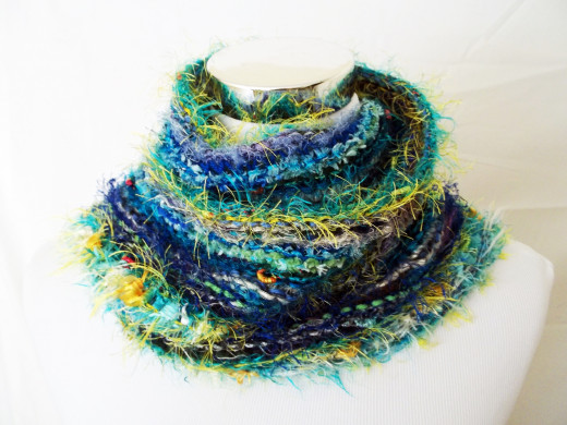 A scrap yarn scarf knit lengthwise.