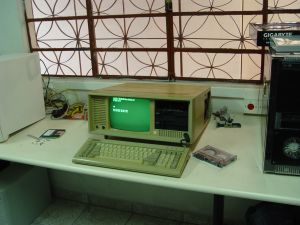 Not a PC in the original sense; sometimes referred to as a 'luggable' computer.