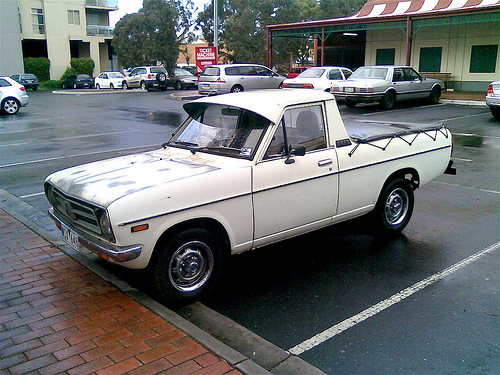 The tiny white van. 