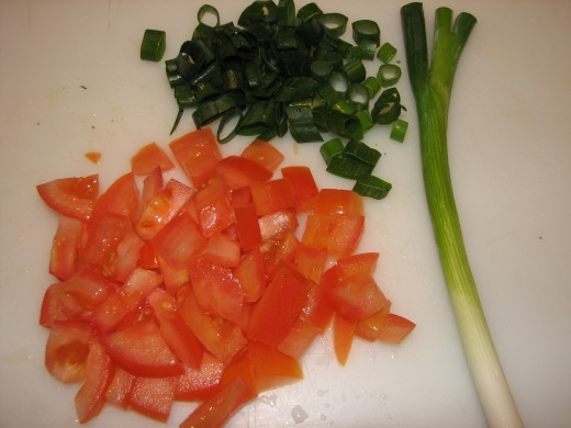 Diced Tomato and sliced head of an Eschallot