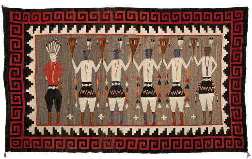 A pictorial rug with six Yei figures. Originated at Lukachukai Trading Post in Arizona. Expertly woven of native handspun wool with aniline dye. Circa 1930