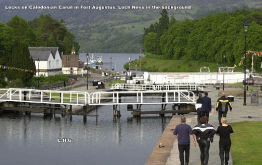 Locks on Caledonian Canal in Fort Augustus, Loch Ness in the background