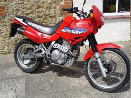 The Honda 650 Dominator. Off-roading is not for me and anyway, what's with that silly bikini fairing?