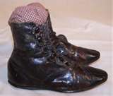 This was the homely style for children's regular shoes of that day - long ago.  They were worn till they had holes in the soles.