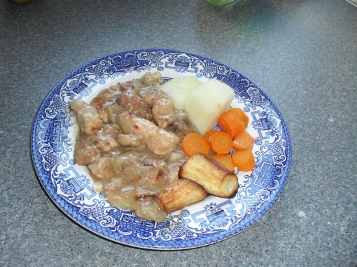 The chicken with roast parsnips, potatoes and carrots