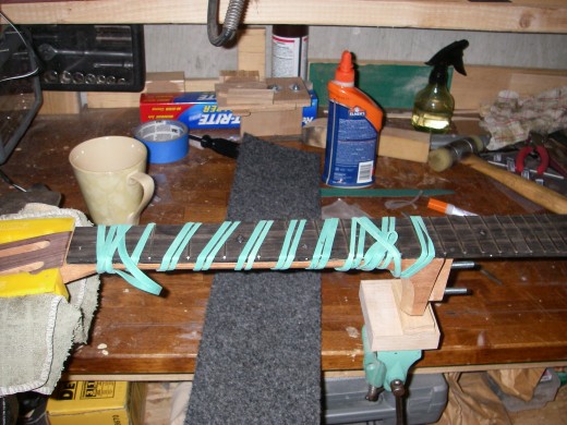Gluing fret board to neck