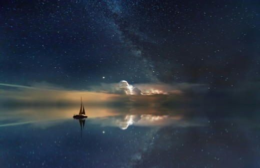 Black sailing boat, photo by Johannes Plenio on Unsplash       