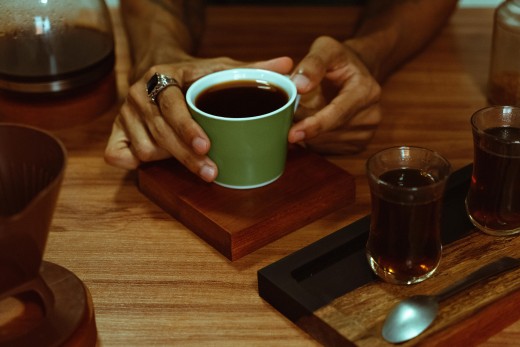 As my hands gently embrace the warmth of my morning cup, my lips bring forth a smile...