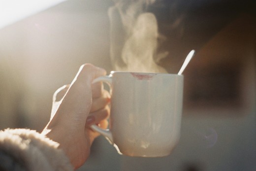 Time-lapse photography of smoke from a white ceramic coffee mug, photo by Mink Mingle on Unsplash