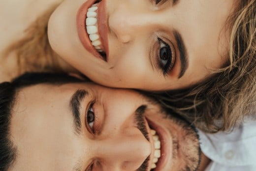 A man and woman taking a selfie