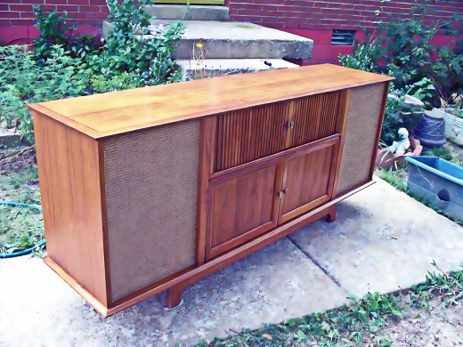 1961 Curtis Mathes Royal Dane Stereo, The Royal Dane, High Fidelity Combination AM/FM Radio, stereo with optional television. World’s finest High-Fidelity Home Music Center—the outstanding combination of the most beautiful Danish Modern Cabinet.