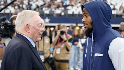 Dallas Cowboys Owner Jerry Jones and Some Guy Who Can't Stop the Run