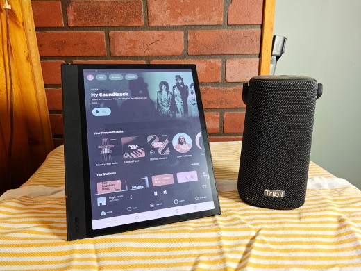 The  BOOX Note Air 4C Colored E Ink Tablet is playing music while connected to a Bluetooth speaker