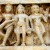 A hermit stands in the centre unperturbed in company of a couple engaged in sex and two dancers in his right. Wall of Jagdishji's temple. A hermit stands in the centre unperturbed in company of a couple engaged in sex and two dancers in his right. Wall of Jagdishji's temple.