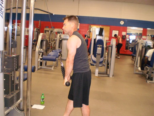 Down with an outward movement to squeeze the triceps