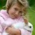 Easy to care for easy to love.  Child with her pet rabbit.      sawy-cafe.com photo credit