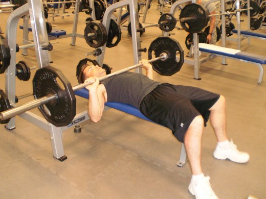 The Down position of the flat bench exercise.