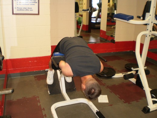 The Hyperextension down position.  Add weight to increase resistance.