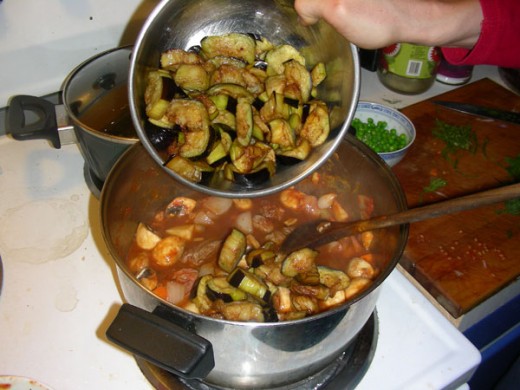 Add the fried eggplants