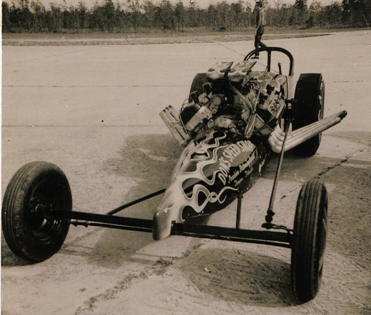 Another version of the "Swamp Rat". Notice the difference in paint jobs from car to car, as well as the more sleek "needle nose" design. Both cars were there the same day in 1958.