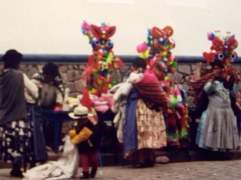 Quechua women sell offerings  at a shrine. Bolivia, South America