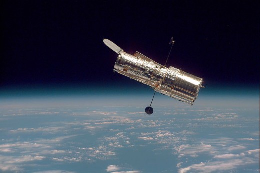Courtesy of NASA/   1997 Hubble against Earth's horizon.