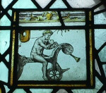 The naked angel from the "Bicycle Window" in St Giles's Church, Stoke Poges