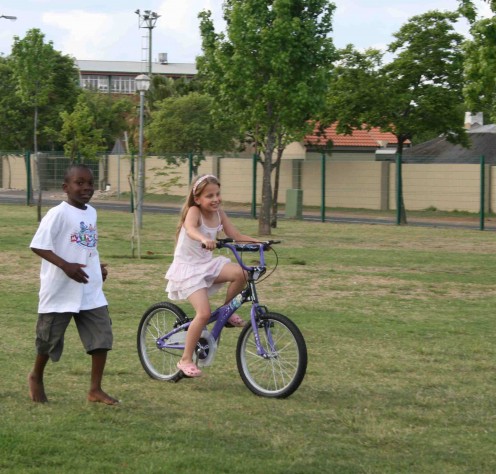 Caitlin riding well now - this was taken a few days ago. She is with a school friend
