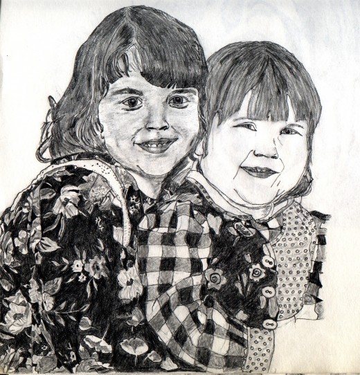 After Drawing.  Instead of redoing my portrait, I decided instead to draw family members.  My sister gave me a portrait picture of her two daughters.  I used it to create this drawing.