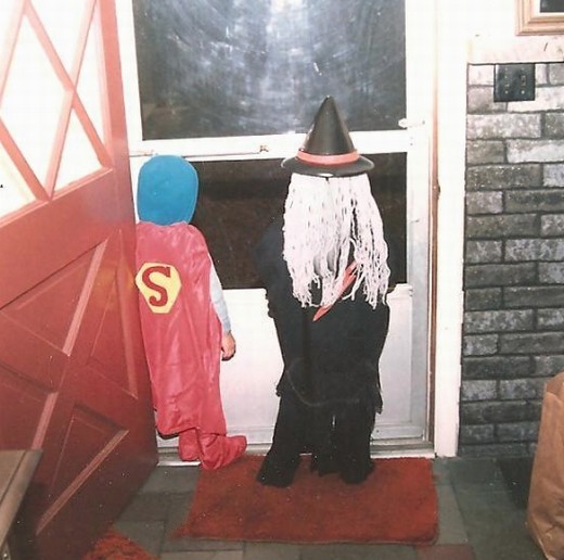 BACK OF SUPERMAN AND WITCH