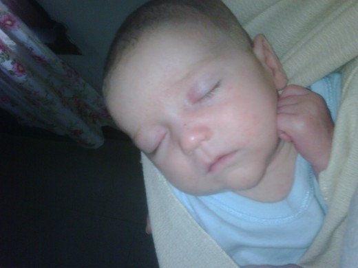My little bundle in his sling.