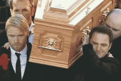 Ronan Keating on the left and Boyzone members helped carry Stephen's coffin