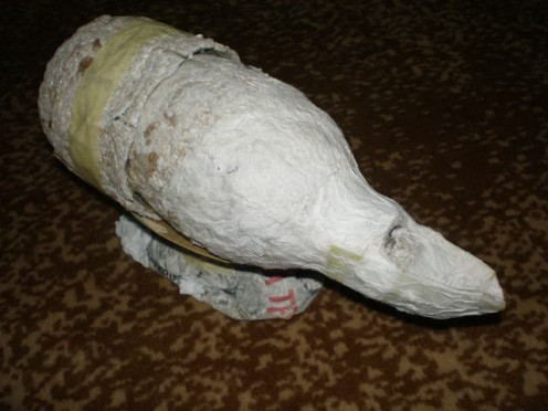 The tissue holder after the pasting dried and to be assembled with its stand.