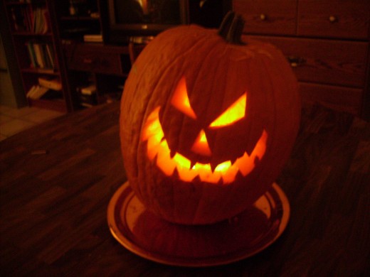 Scary Halloween Jack O' Lantern glowing in the dark