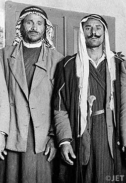 Muhammed edh-Dhib and Ahmed Mohammed, two Bedouin shepherds of the Ta'amireh tribe.