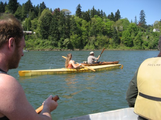 Paddling our local river:  kayak glide past a birdwatching group