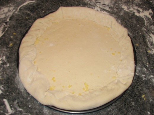 Now fold over the outside edge to cover your grated cheese - Image by LeonJane Now fold over the outside edge to cover your grated cheese - Image by LeonJane
