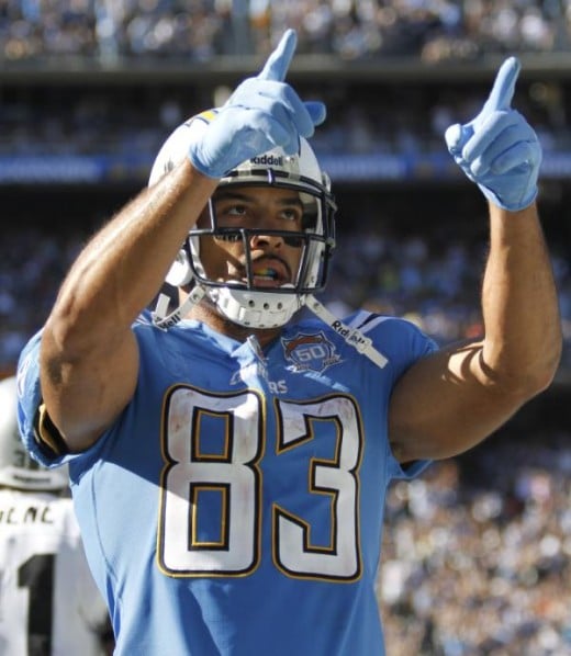 San Diego Chargers wide receiver Vincent Jackson points to the crowd after scoring a second quarter touchdown during an NFL football game against the Oakland Raiders Sunday, Nov. 1, 2009 in San Diego. (AP Photo/Denis Poroy)